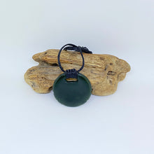 Load image into Gallery viewer, Carved Ridge bound Porohita Disc Pendant