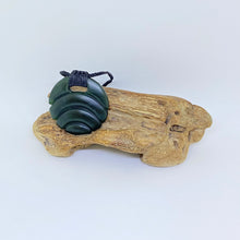 Load image into Gallery viewer, Carved Ridge bound Porohita Disc Pendant