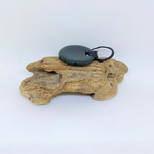 Load image into Gallery viewer, Carved Ridge bound Porohita Disc Pendant