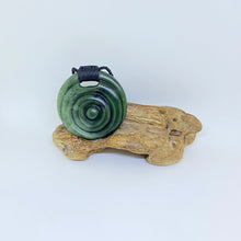 Load image into Gallery viewer, Large Carved Ridge-bound Porohita Disc Pendant