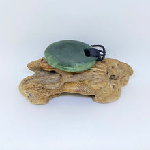 Load image into Gallery viewer, Large Carved Ridge-bound Porohita Disc Pendant