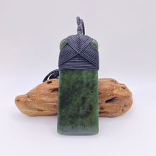 Load image into Gallery viewer, Kokopu Cross-bound Toki Pendant