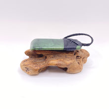Load image into Gallery viewer, Kokopu Cross-bound Toki Pendant