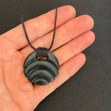 Load image into Gallery viewer, Carved Ridge bound Porohita Disc Pendant
