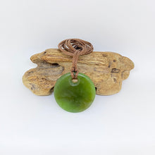 Load image into Gallery viewer, Carved Porohita Disc Pendant

