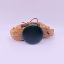 Load image into Gallery viewer, Large Carved Porohita Disc Pendant
