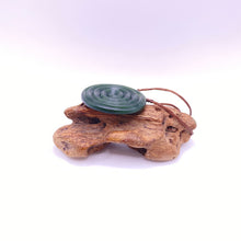 Load image into Gallery viewer, Large Carved Porohita Disc Pendant
