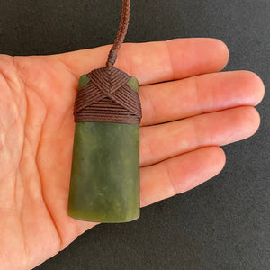 Cross-bound Toki Pendant