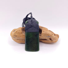 Load image into Gallery viewer, Rimu Cross-bound Toki Pendant
